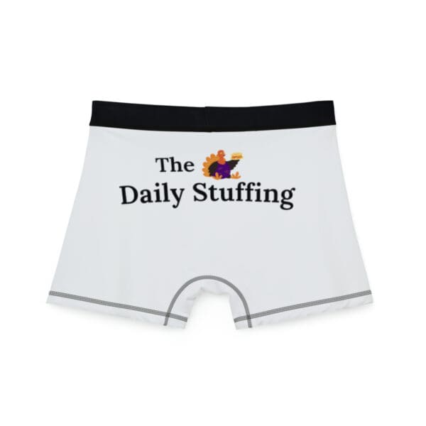 A pair of boxers with the word " the daily stuffing ".