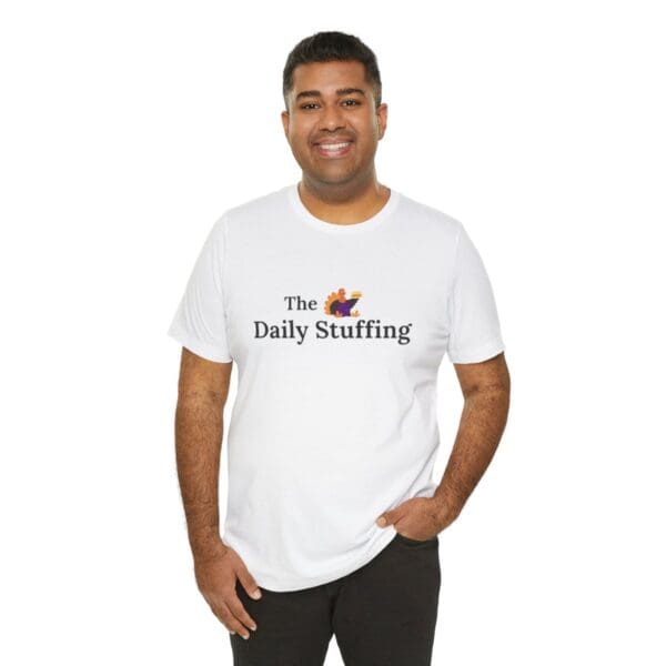 A man wearing a white t-shirt with the daily staffing logo.