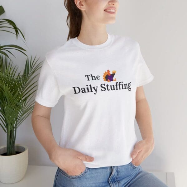 A woman is posing for the daily stuffing t-shirt.